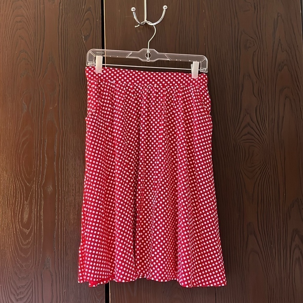 Mythereal by Glam Girl red with white polka dotted skirt. Size medium.